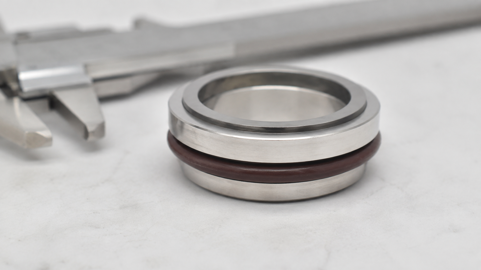 Stationary mechanical seal seat dimensions showing rigid OD ID thickness rubber cup and mounting profile